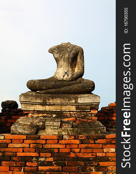 Headless Buddha ruins at the temple in Ayutthaya