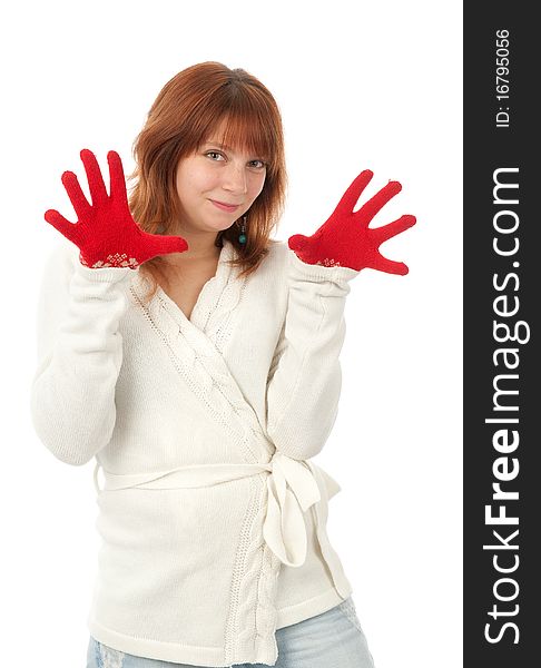 Beautiful redhead woman wint red mittens