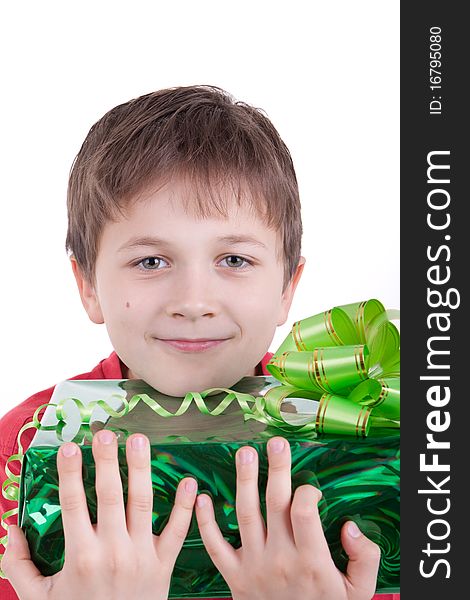 The boy has received a gift, Holds a box with a gift