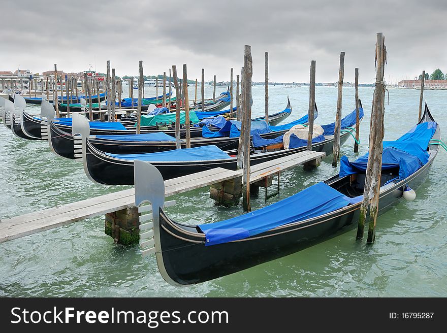 Gondolas on the San Marco canal in Venice, Italy. Gondolas on the San Marco canal in Venice, Italy.