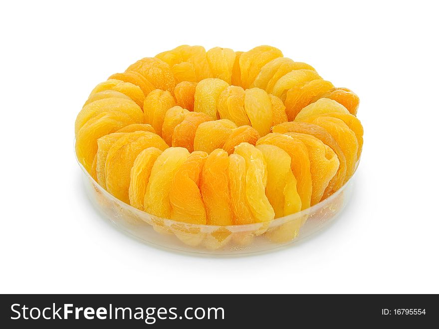 Dry peaches isolated on white