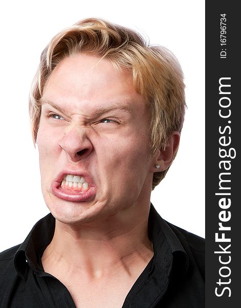 Closeup of furious young man on white background