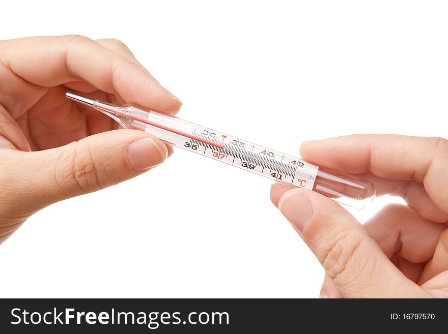Hands holding thermometer showing 37'C, isolated on white