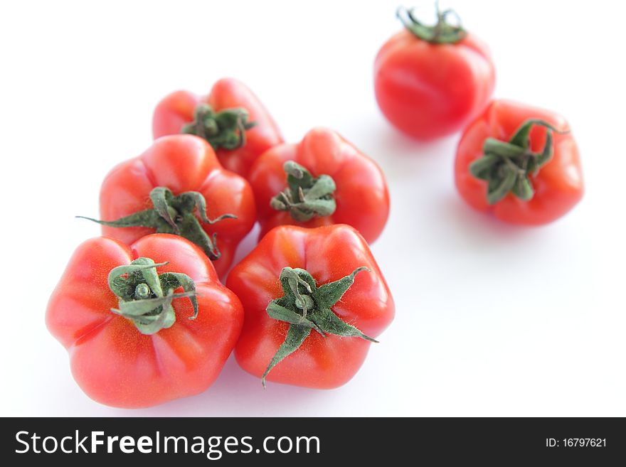 Ripe Red Tomatoes On White Background