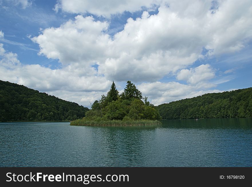 Landscape consisting of mountains and lake. The Plitvice Lakes, national park in Croatia