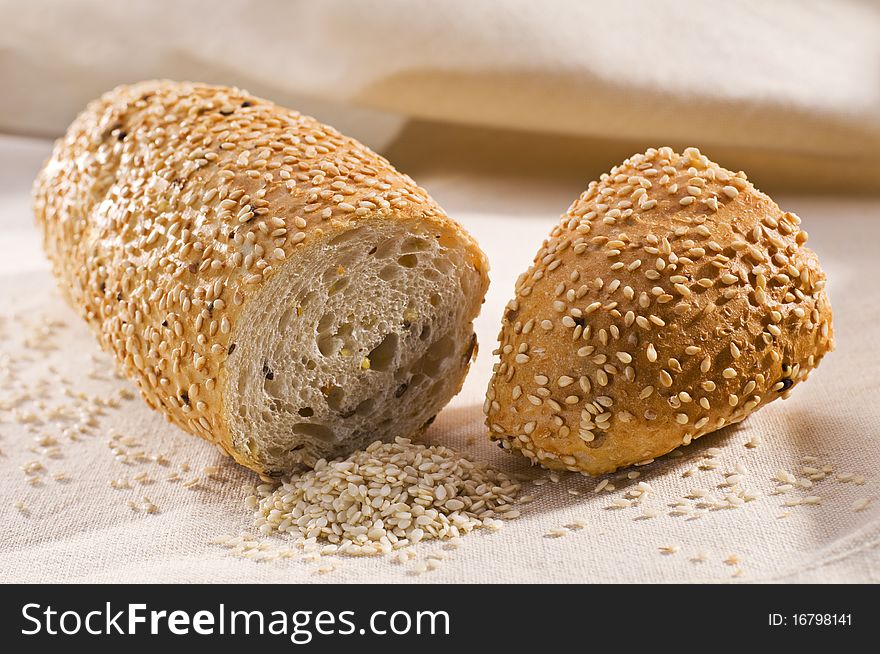 Fresh baguette with sesame seeds close up shoot. Fresh baguette with sesame seeds close up shoot