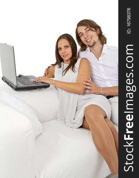 Young european couple surfing the web at home