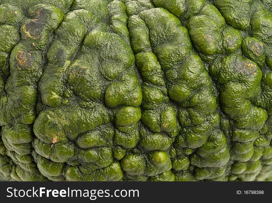 Close-up of green pumpkin. Pumpkin is ecological and natural, grew in rural garden. Close-up of green pumpkin. Pumpkin is ecological and natural, grew in rural garden.