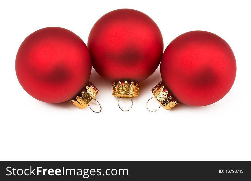 Red lovely Christmas baubles isolated on white background. For Christmas and new year decorations. Red lovely Christmas baubles isolated on white background. For Christmas and new year decorations.