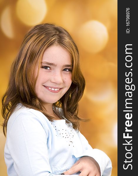 Pretty young girl with sparkling background