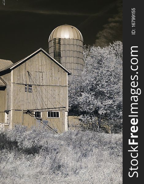 Infrared image of old barn and silo. Infrared image of old barn and silo