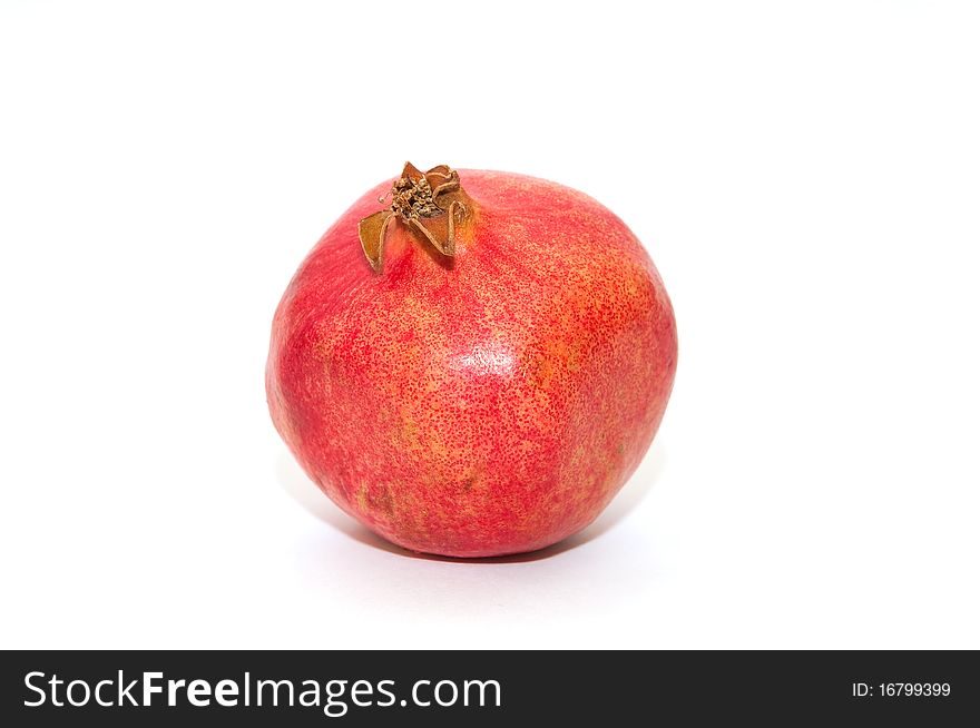 Red pomegranate on white background. Red pomegranate on white background