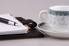 Cup And Organizer Royalty Free Stock Photos