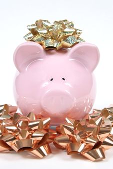 Pink Piggy Bank With Christmas Bows Stock Image