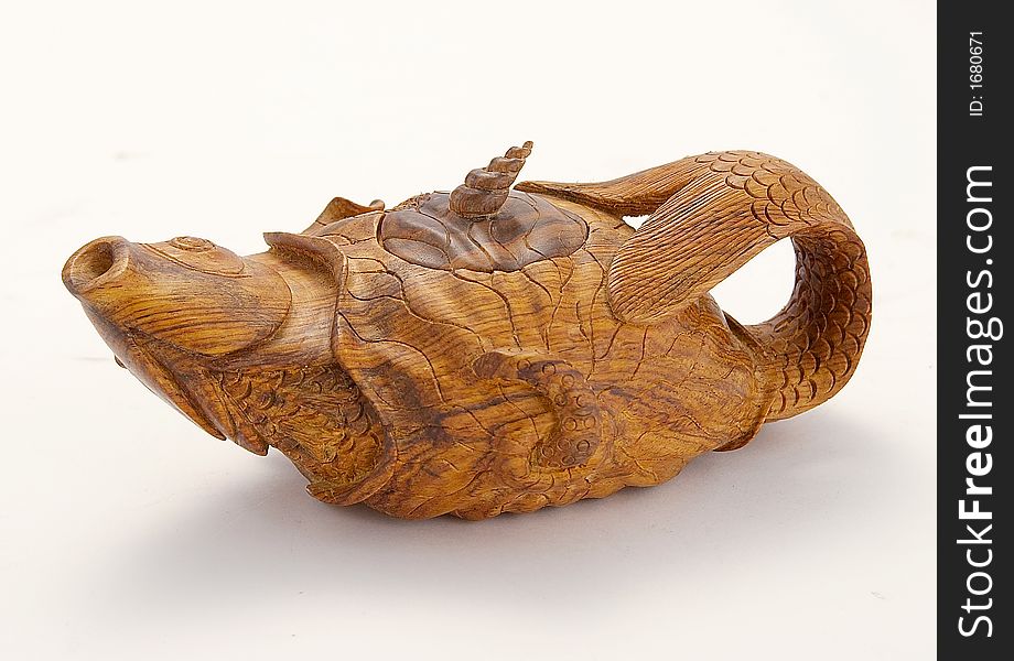 Wooden teapot from Chinese wood carving shop. Wooden teapot from Chinese wood carving shop