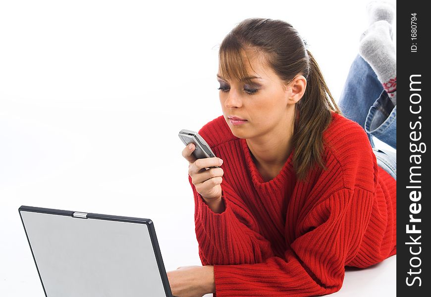 Young pretty women on white couch relaxing and using laptop computer. Young pretty women on white couch relaxing and using laptop computer