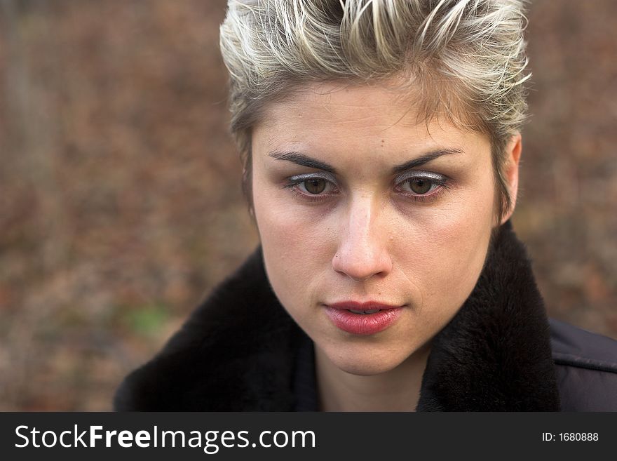 Portrait of a business woman outdoor in a park with various expressions. Portrait of a business woman outdoor in a park with various expressions