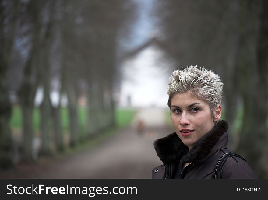 Portrait of a business woman outdoor in a park with various expressions. Portrait of a business woman outdoor in a park with various expressions