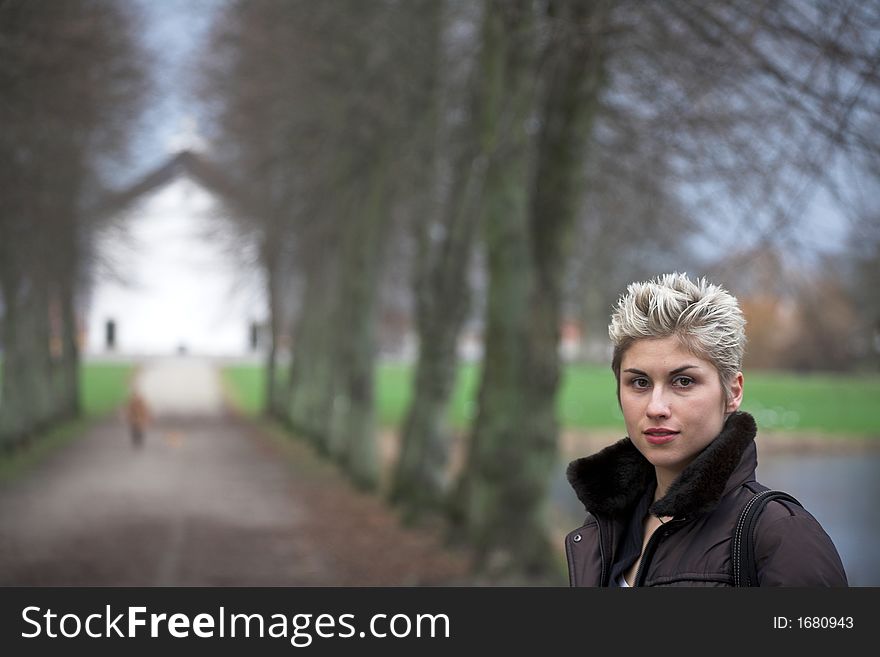 Portrait of a business woman outdoor in a park with various expressions. Portrait of a business woman outdoor in a park with various expressions