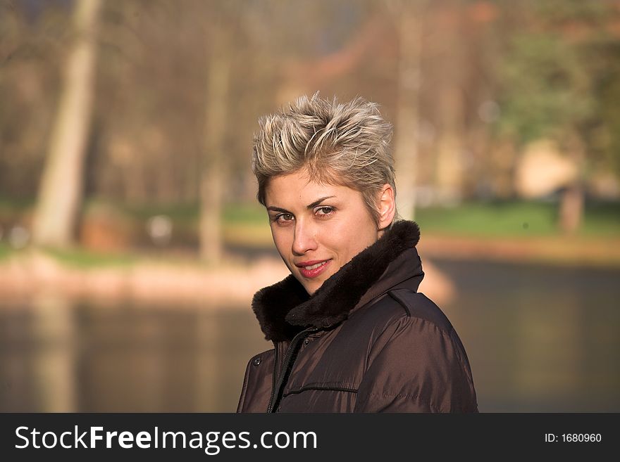 Portrait of a business woman outdoor in a park with various expressions. Portrait of a business woman outdoor in a park with various expressions
