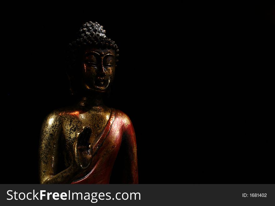 Buddha Stone Statue (Macro shot with black background)