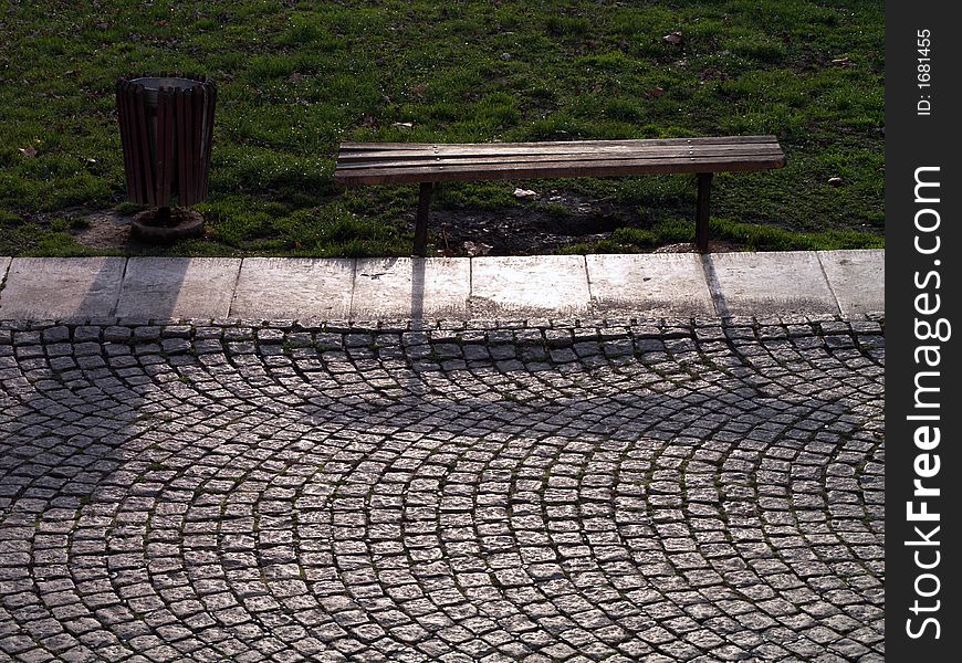 Old and ruined bench anr recycle bin in the park. Old and ruined bench anr recycle bin in the park