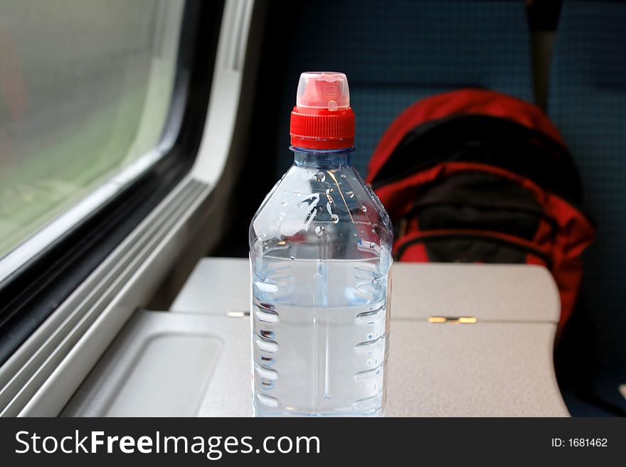 Travelling by Train (with Water and Knapsack). Travelling by Train (with Water and Knapsack)