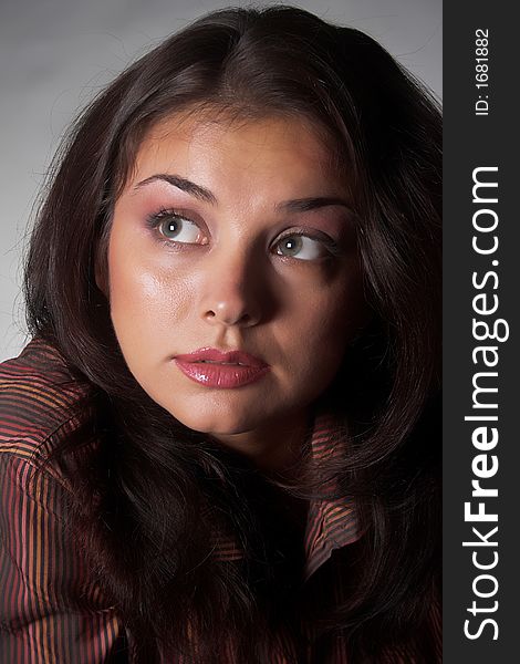 Closeup portrait of friendly  brunette