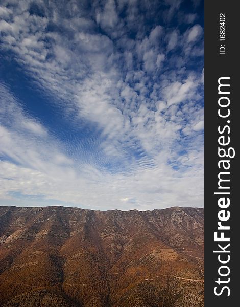 Mountain slopes with high altitude clouds. Mountain slopes with high altitude clouds