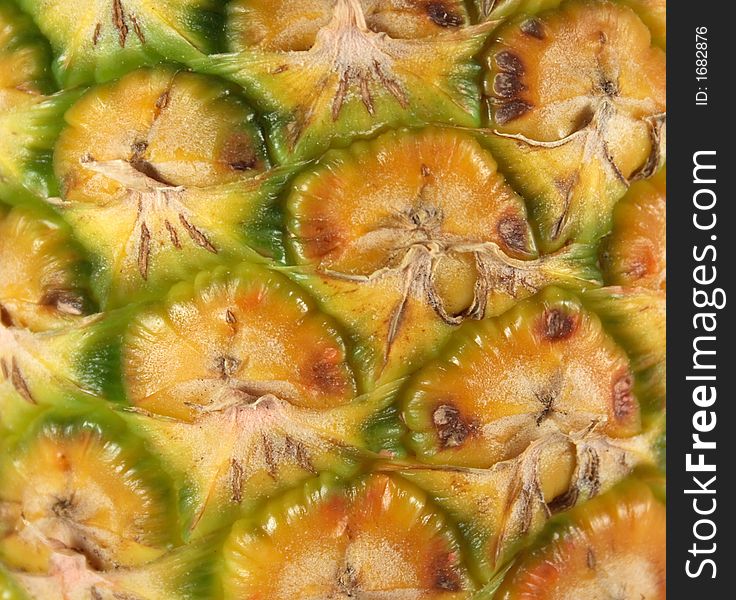 Pineapple texture with the green and yellow color