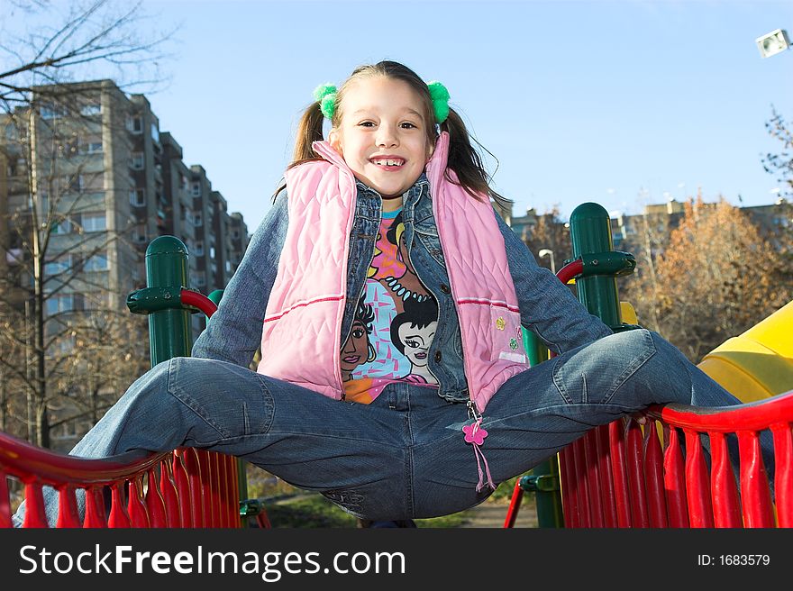 A little pretty child at the playground