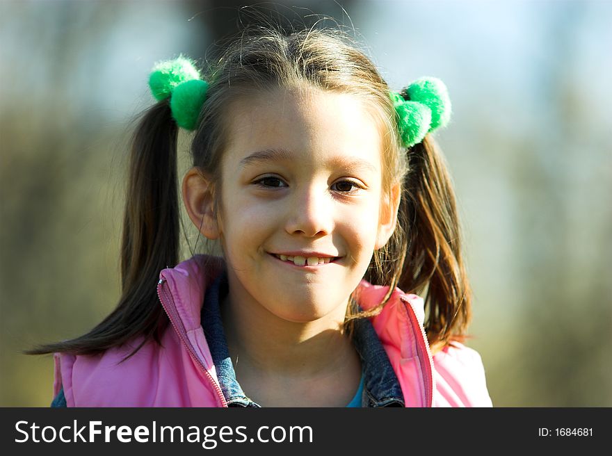 Young pretty child in the park