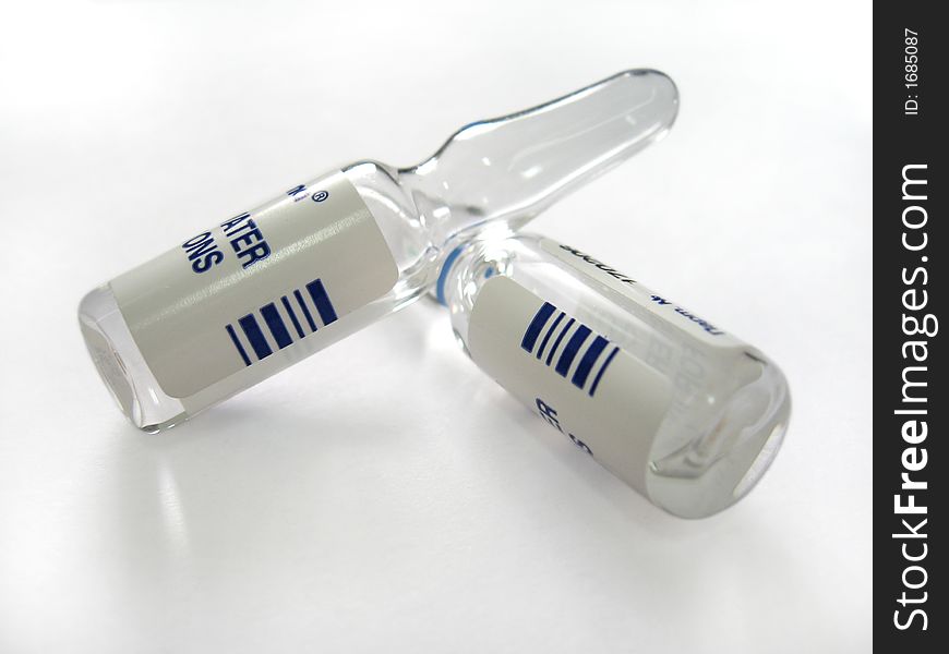 A glass tube with sterilized water for injections