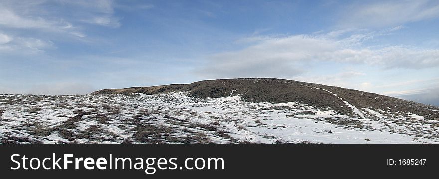 Early snow on the top of carpathian mountain