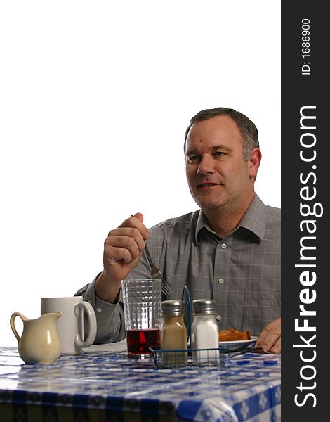 Man sitting in diner or cafe eating. Man sitting in diner or cafe eating