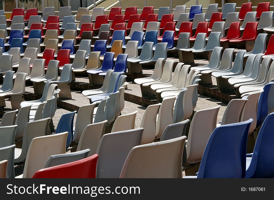 Colourful Empty Stadium Seats In Rows