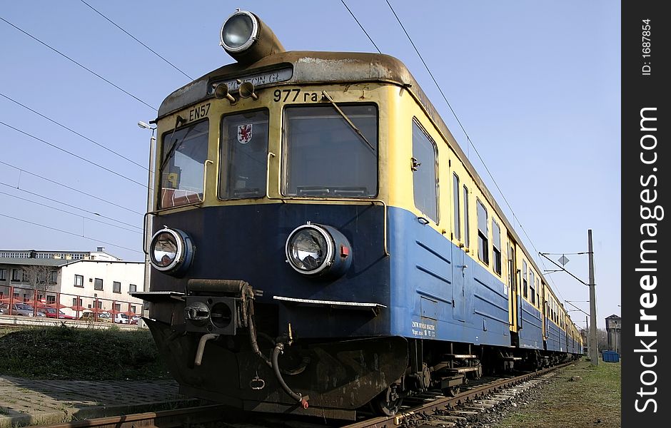 Vintage blue and yellow train on a station, Poland