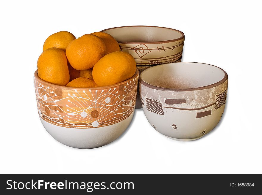 Tangerines in flowerpot and two empty pots isolated on white with path. Tangerines in flowerpot and two empty pots isolated on white with path