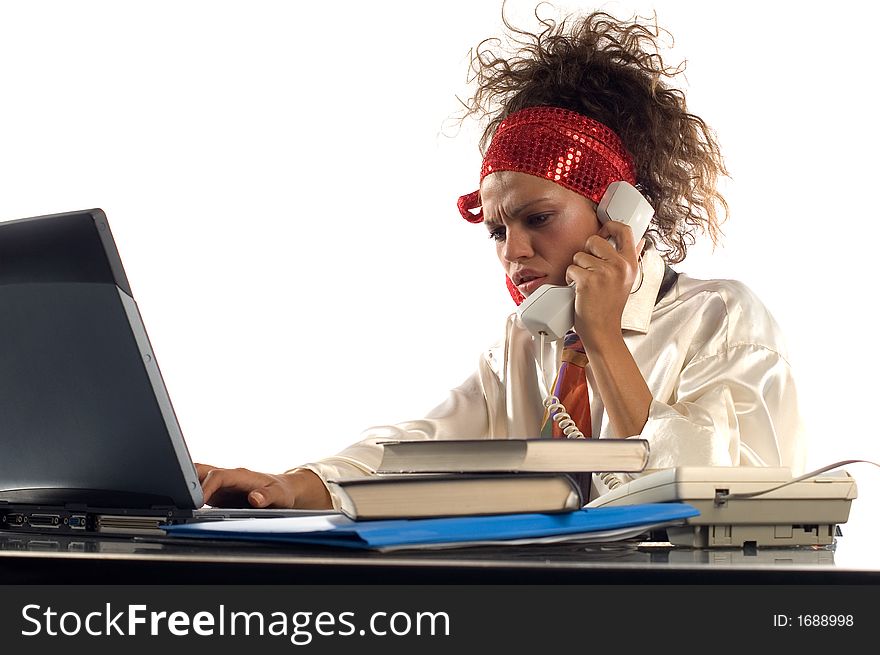 Young businesswoman talking on phone in office. Young businesswoman talking on phone in office