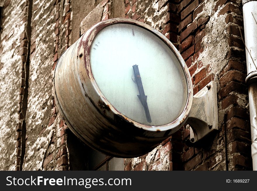 An old Clock in the deep industries of Coswig/Saxony.