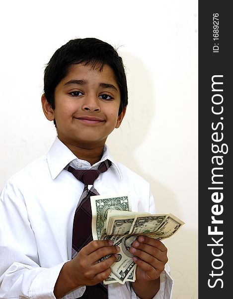 A Child delighted after earning some cash. A Child delighted after earning some cash