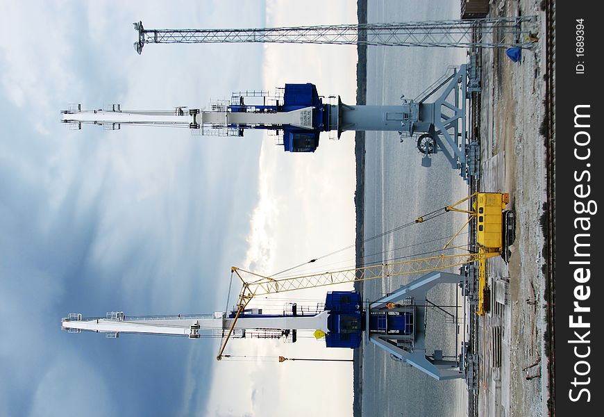 Three cranes at the port