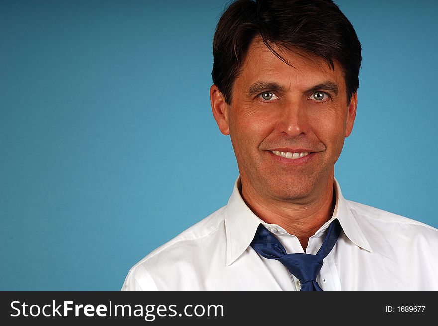 Portrait of a Casual business man with loose shirt and tie. Portrait of a Casual business man with loose shirt and tie