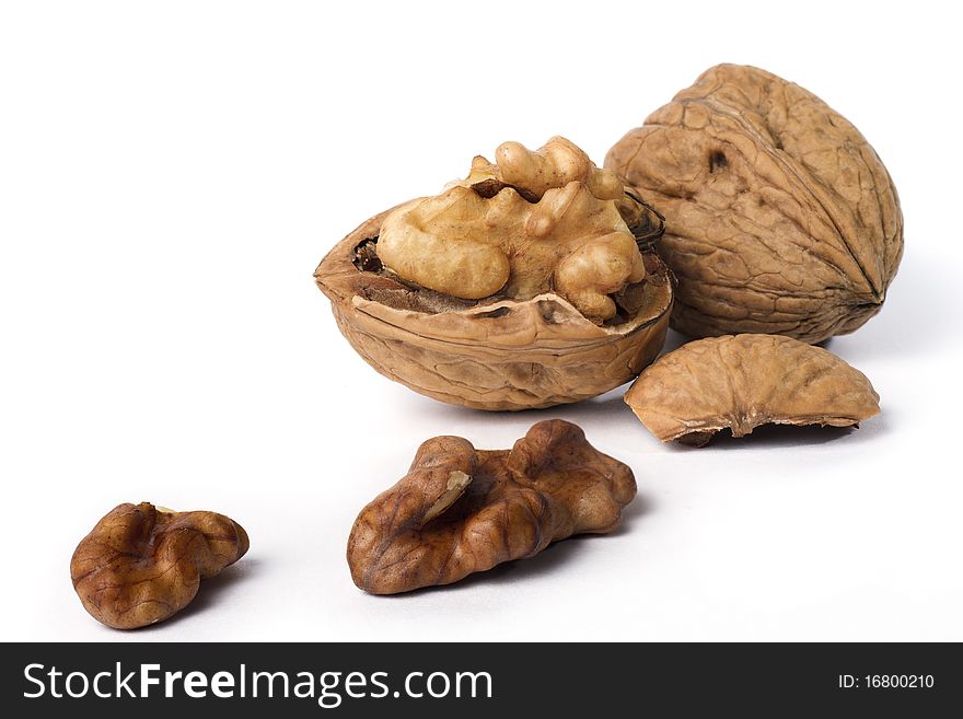 Close-up of a walnut isolated on white background