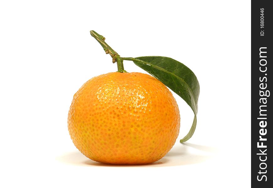Tangerine with leave on the white isolate background