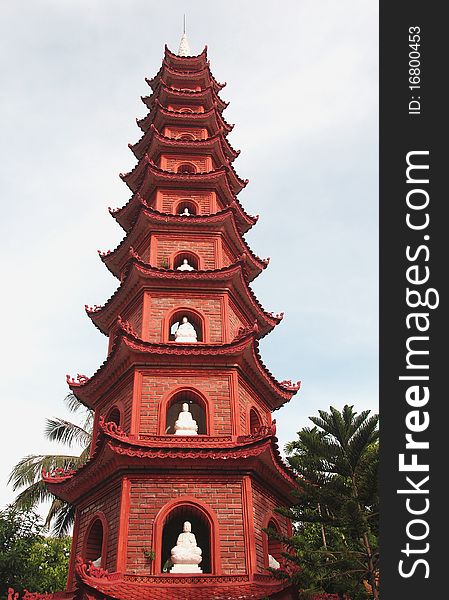 Buddhist, pagoda temple tower with Buddha statues. Buddhist, pagoda temple tower with Buddha statues