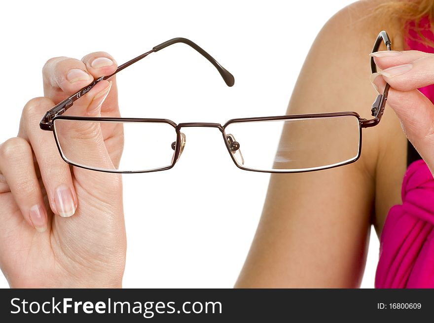 Glasses in girl's hands isolated. Glasses in girl's hands isolated