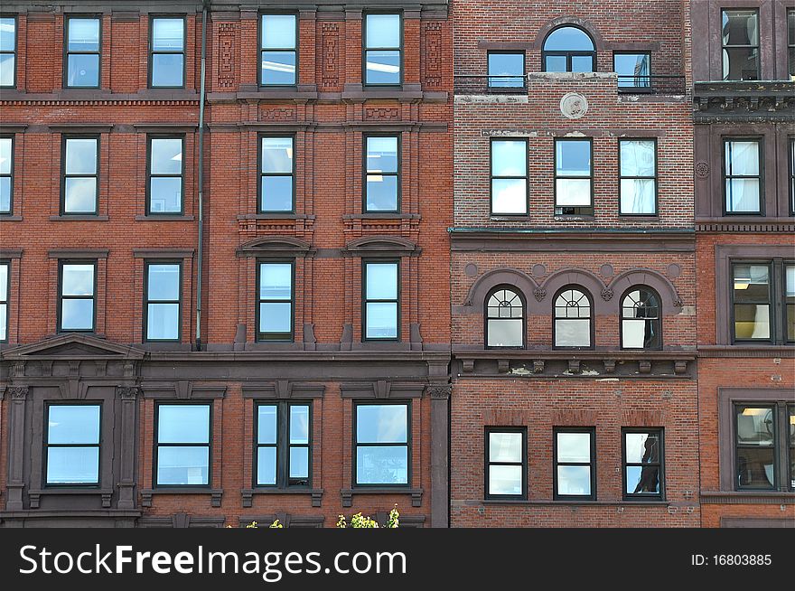 Bricks facade with windows in old traditional building of Boston, Massachusetts, United States. Bricks facade with windows in old traditional building of Boston, Massachusetts, United States