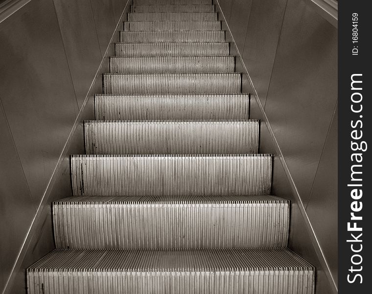 Escalator staircase - abstract image of escalator staircase