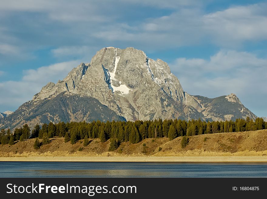 The 12,605 foot Mount Moran and Skillet Glacier rises above the Teton Valley floor.